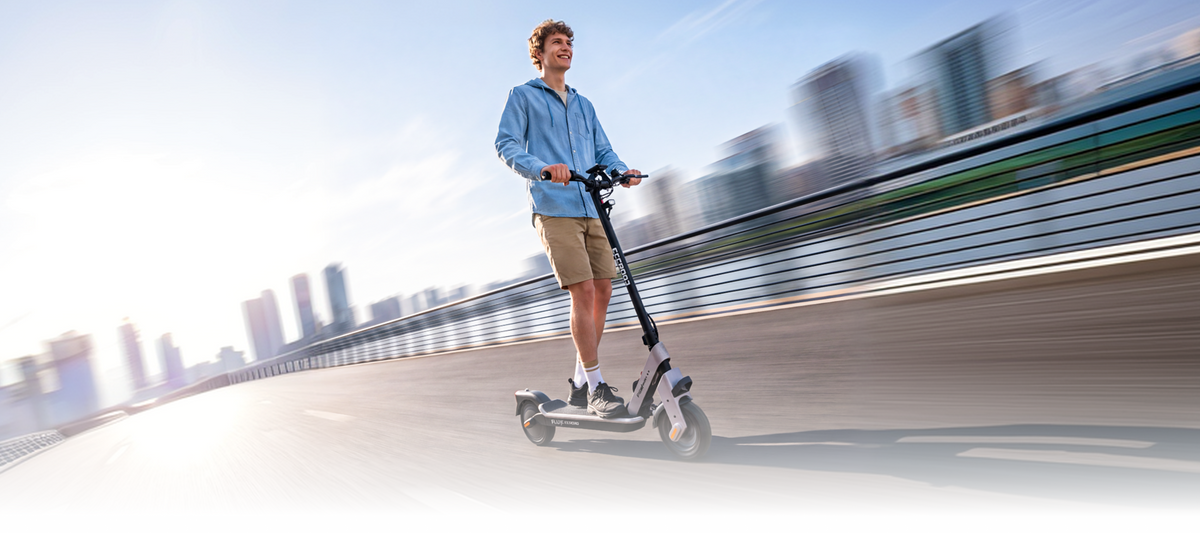 Rider on an electric scooter with 8.5-inch honeycomb tires